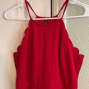 High, scalloped neck red dress. Size small. A-line and above knee.